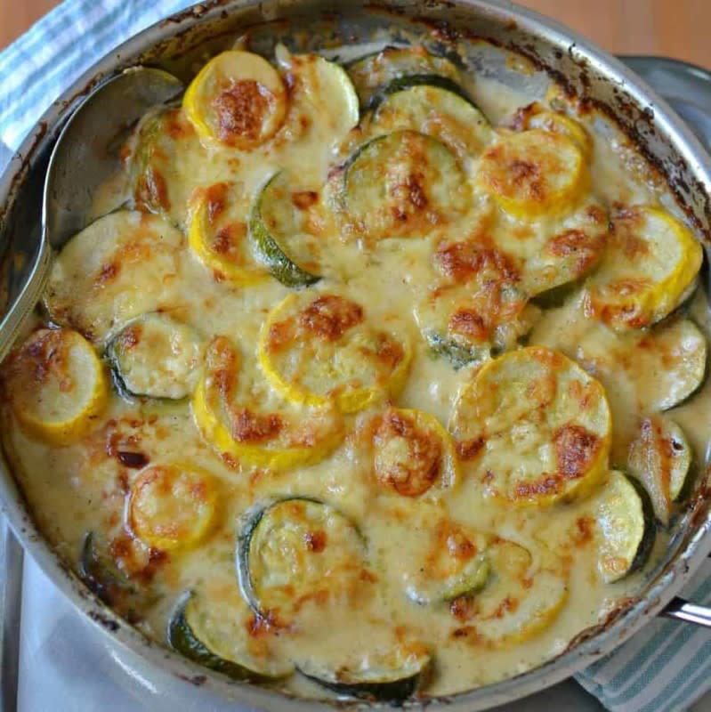 <p>Small Town Woman</p><p>This luscious and creamy medley of zucchini, yellow squash and onion will make a summer squash lover out of you!</p><p><strong>Get the recipe: <a href="https://www.smalltownwoman.com/zucchini-and-yellow-squash-au-gratin/" rel="nofollow noopener" target="_blank" data-ylk="slk:Zucchini and Yellow Squash Au Gratin;elm:context_link;itc:0;sec:content-canvas" class="link rapid-noclick-resp">Zucchini and Yellow Squash Au Gratin</a></strong></p>