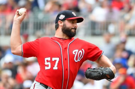 FILE PHOTO: Sep 16, 2018; Atlanta, GA, USA; Washington Nationals starting pitcher Tanner Roark (57) in acton on the mound against the Atlanta Braves during the second inning at SunTrust Park. Mandatory Credit: Adam Hagy-USA TODAY Sports