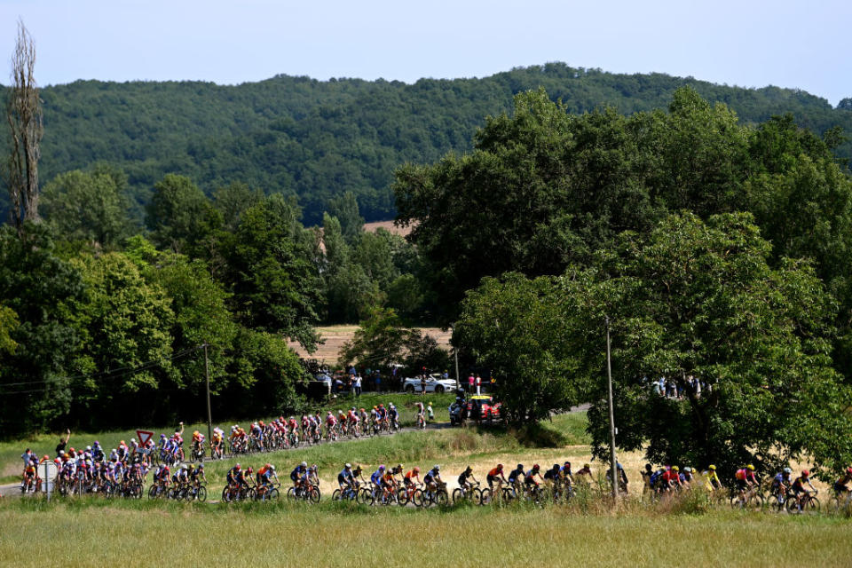 BLAGNAC FRANCE  JULY 28 A general view of Lotte Kopecky of Belgium and Team SD Worx  Protime  Yellow leader jersey and the peloton passing through a landscape during the 2nd Tour de France Femmes 2023 Stage 6 a 1221km stage from Albi to Blagnac  UCIWWT  on July 28 2023 in Blagnac France Photo by Tim de WaeleGetty Images