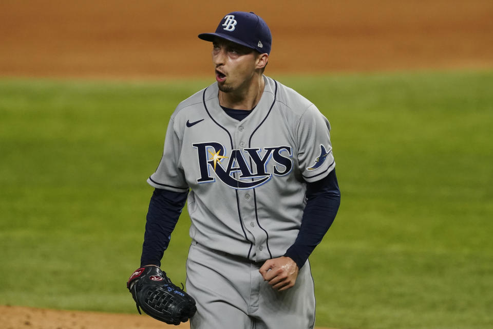 Tampa Bay Rays starting pitcher Blake Snell celebrates after fourth inning in Game 2 of the baseball World Series against the Los Angeles Dodgers Wednesday, Oct. 21, 2020, in Arlington, Texas. (AP Photo/Tony Gutierrez)