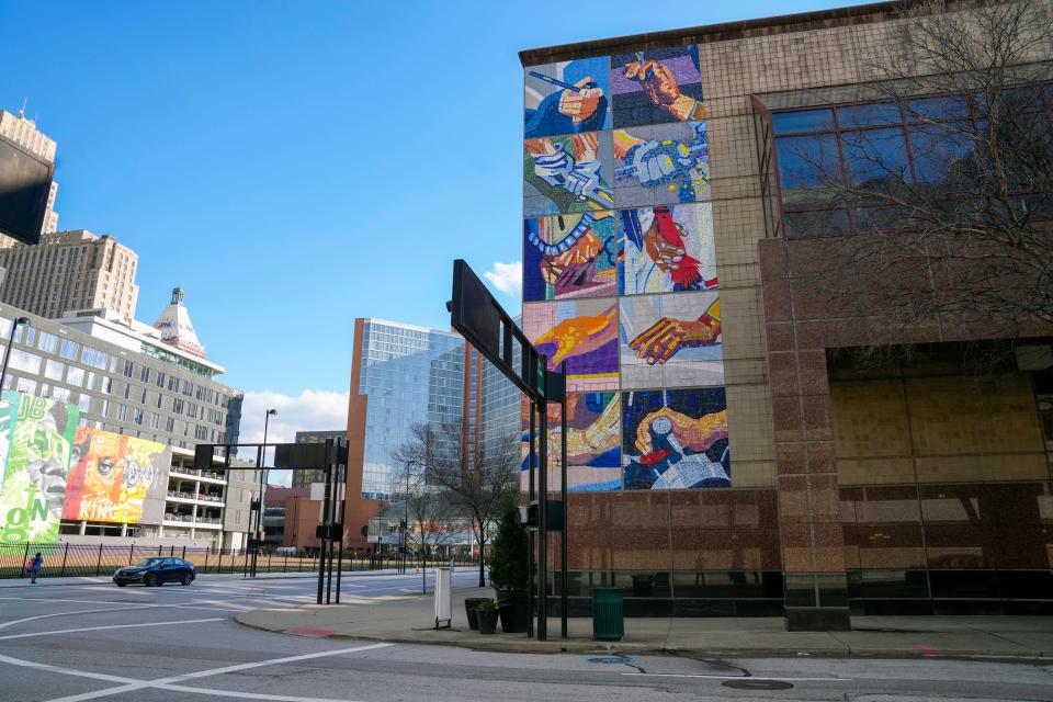 “The Hands that Built Our City” mural on the Sixth and Elm streets corner of the Duke Energy Convention Center will not be kept during the remodel.