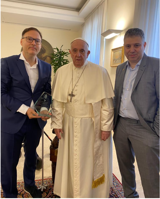 L-R Cinema for Peace founder Jaka Bizilj, Pope Francis, filmmaker Evgeny Afineevky