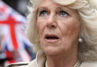 LONDON, ENGLAND - JUNE 03: Camilla, Duchess of Cornwall sings the National Anthem as she attends the 'Big Jubilee Lunch' in Piccadilly ahead of the Diamond Jubilee River Pageant on June 3, 2012 in London, England. For only the second time in its history the UK celebrates the Diamond Jubilee of a monarch. Her Majesty Queen Elizabeth II celebrates the 60th anniversary of her ascension to the throne. Thousands of well-wishers from around the world have flocked to London to witness the spectacle of the weekend's celebrations. The Queen along with all members of the royal family will participate in a River Pageant with a flotilla of a 1,000 boats accompanying them down The Thames. (Photo by Chris Jackson - WPA Pool /Getty Images)
