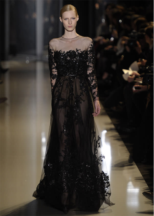 <b>Elie Saab SS13 </b><br><br>Sheer fabrics, long sleeves and jewelling was seen across the collection.<br><br>©Rex