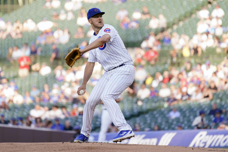 Chicago Cubs starting pitcher Jameson Taillon winds up in the first inning of a baseball game against the Washington Nationals Tuesday, July 18, 2023, in Chicago. (AP Photo/Charles Rex Arbogast)