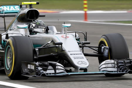 Mercedes Formula One driver Nico Rosberg of Germany drives during qualifying session. REUTERS/Aly Song