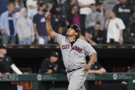 Cleveland Guardians' Josh Naylor celebrates his game-tying grand slam off Chicago White Sox relief pitcher Liam Hendriks during the ninth inning of a baseball game Monday, May 9, 2022, in Chicago. (AP Photo/Charles Rex Arbogast)