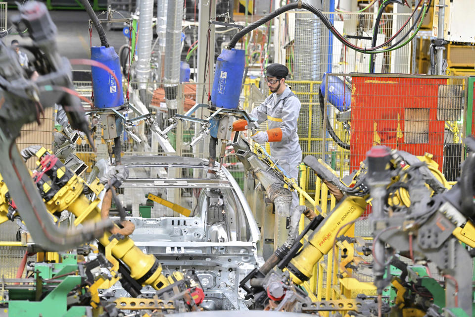 A worker assembles vehicle parts on a production line inside Renault factory, on the outskirts of Tangier, Morocco, Monday, April 29, 2024. Morocco has grown into a car manufacturing juggernaut over the past fifteen years, positioning itself strategically between East and West as the automotive industry transitions to electric vehicles. The country supplies more cars to Europe than China, India or Japan through new highways and an expanded port in Tangier. (AP Photo)