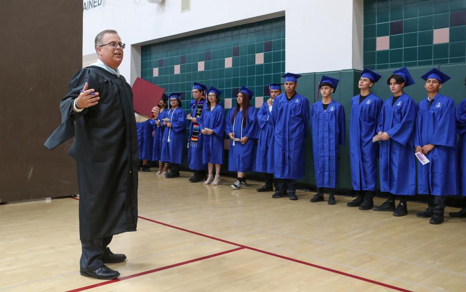 Kevin Bibo gives instruction to graduates before the DSUSD Summer Class of 2023 graduation ceremony at La Quinta High School in La Quinta, Calif., July 13, 2023. 