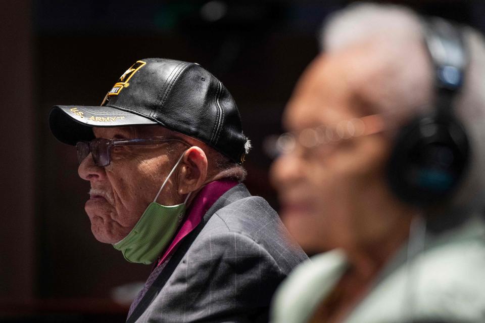 Hughes Van Ellis(L), a Tulsa Race Massacre survivor and World War II veteran, testifies before the Civil Rights and Civil Liberties Subcommittee hearing on "Continuing Injustice: The Centennial of the Tulsa-Greenwood Race Massacre" on Capitol Hill in Washington, DC on May 19, 2021. (Photo by JIM WATSON / AFP) (Photo by JIM WATSON/AFP via Getty Images) ORG XMIT: 0 ORIG FILE ID: AFP_9AB942.jpg