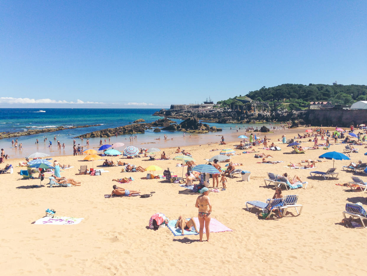 Crowded beach on a hot summer day