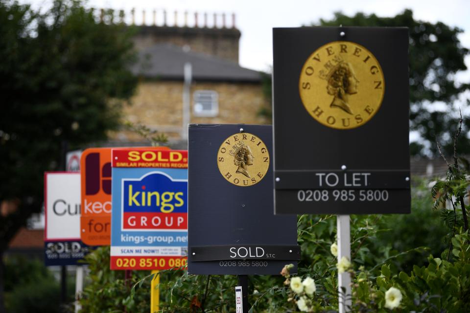 Estate and rental agents' boards are pictured on a residential street in Hackney, east London on August 9, 2019. - House prices and sales are "losing momentum", surveyors say, although parts of the UK are still seeing property values rise. (Photo by Daniel LEAL-OLIVAS / AFP)        (Photo credit should read DANIEL LEAL-OLIVAS/AFP/Getty Images)