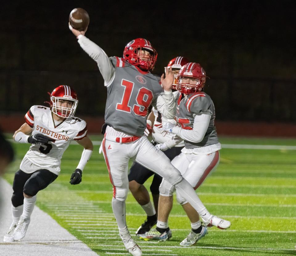 Canton South’s quarterback Poochie Snyder launches a touchdown pass to Tre Wilson giving South a 28-7 lead over Struthers during the third quarter Friday, Nov. 17, 2023.