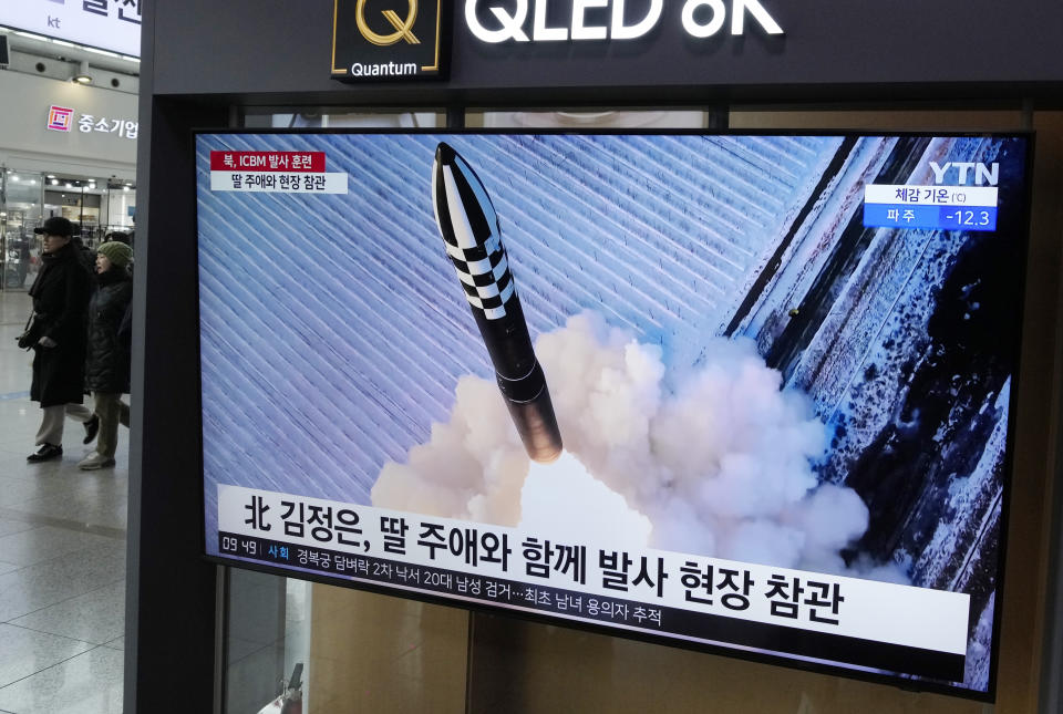 A TV screen shows an image of North Korea's missile launch during a news program at the Seoul Railway Station in Seoul, South Korea, Tuesday, Dec. 19, 2023. North Korean leader Kim Jong Un threatened "more offensive actions" to repel what he called increasing U.S.-led military threats after he supervised the third test of his country's most advanced missile designed to strike the mainland U.S., state media reported Tuesday. (AP Photo/Ahn Young-joon)