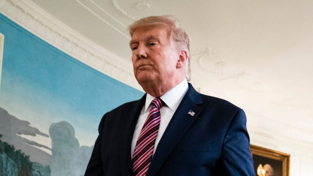 President Donald Trump departs after speaking about potential judicial appointees in the Diplomatic Reception Room of the White House Wednesday. He also fielded questions about the coronavirus and “Rage,” Bob Woodward’s new book about him. (Photo by Doug Mills-Pool/Getty Images)