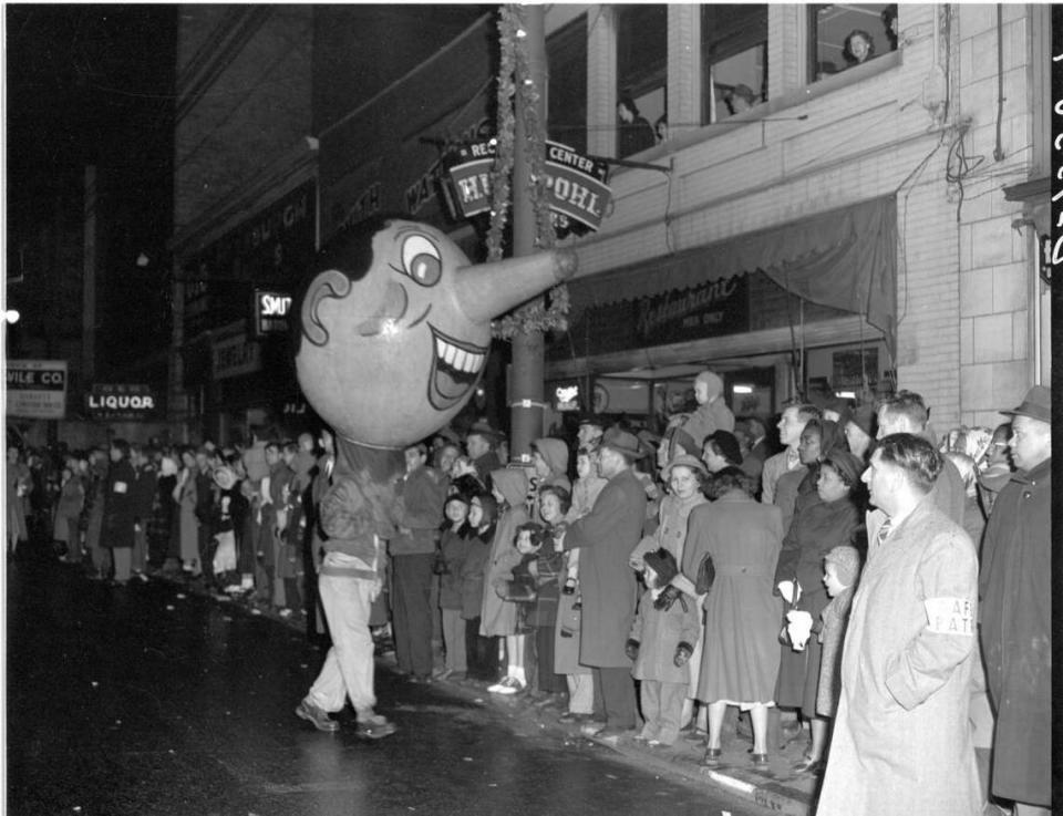 The Lexington Herald reported that 100,000 people braved a cold rainy night on December 1, 1949 to watch the downtown Christmas Parade. Police reported that the parade route from Third and Midland through Main Street to West Second and Broadway was packed solid.