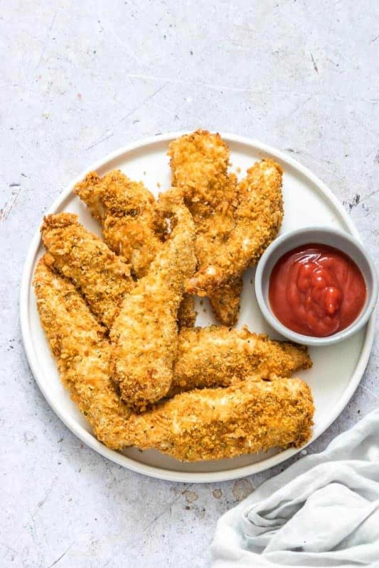 <p>These golden crunchy easy parmesan breaded air fryer chicken tenders are ready in under 15 mins so it makes a great weeknight supper, brunch treat or snack. Serve with some baked fries, a simple salad or some mac and cheese.</p><p><strong>Get the recipe: <a href="https://recipesfromapantry.com/parmesan-crusted-air-fryer-chicken-tenders/" rel="nofollow noopener" target="_blank" data-ylk="slk:Crispy Air Fryer Chicken Tenders;elm:context_link;itc:0;sec:content-canvas" class="link rapid-noclick-resp">Crispy Air Fryer Chicken Tenders</a></strong></p>