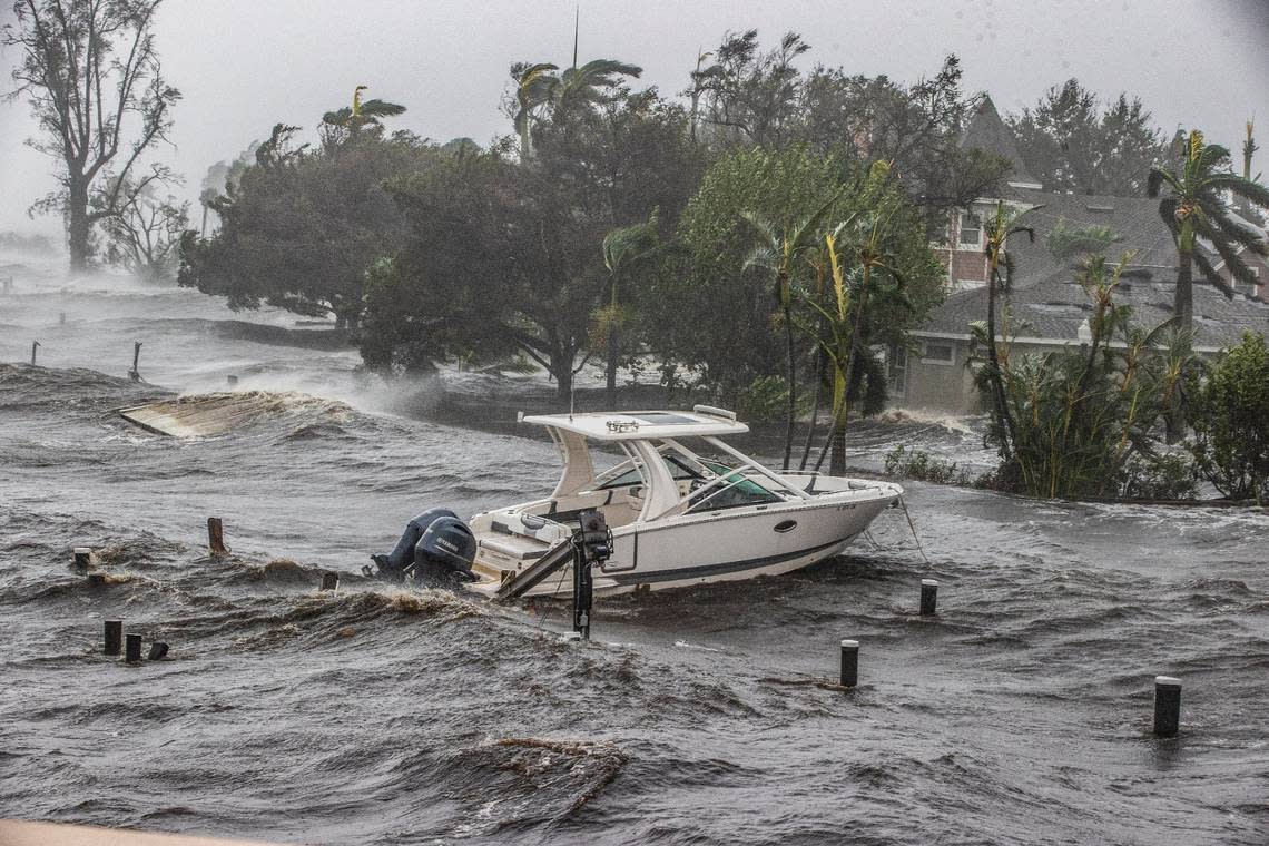 A boat is seen from the Midpoint Bridge in the Caloosahatchee River in Fort Myers as Hurricane Ian hits the West Coast of Florida as Category 4 storm, on Wednesday September 28, 2022