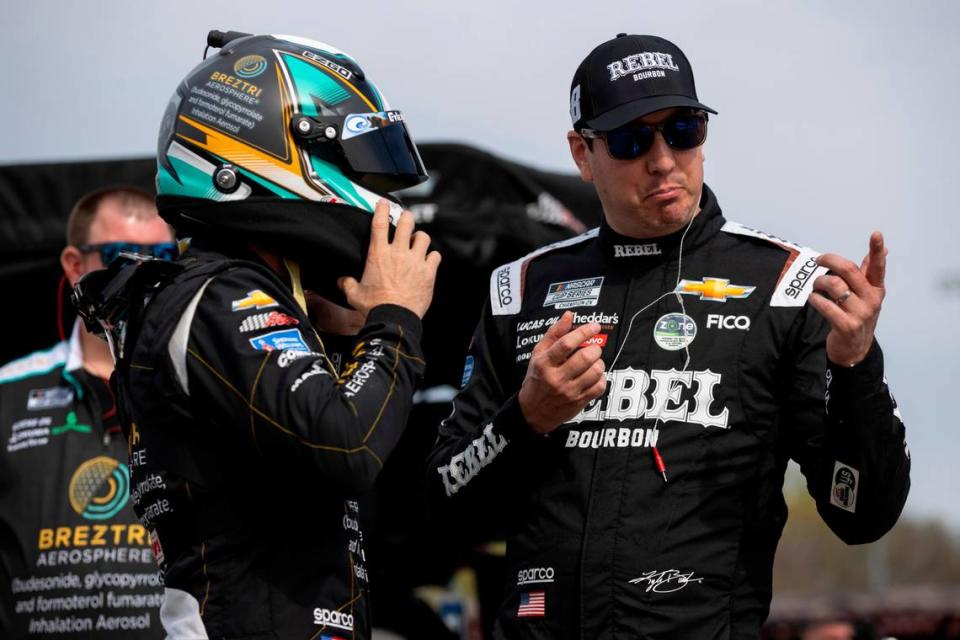 Mar 30, 2024; Richmond, Virginia, USA; NASCAR Cup Series driver Kyle Busch (8) talks to NASCAR Cup Series driver Austin Dillon (3) during practice for the Toyota Owners 400 at Richmond Raceway.