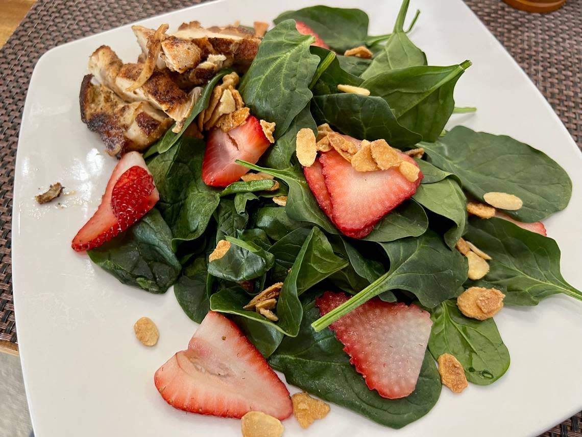 A strawberry-spinach grilled chicken salad at Zack’s Bistro, open for lunch and dinner daily except Sunday along Interstate 30 in Arlington.