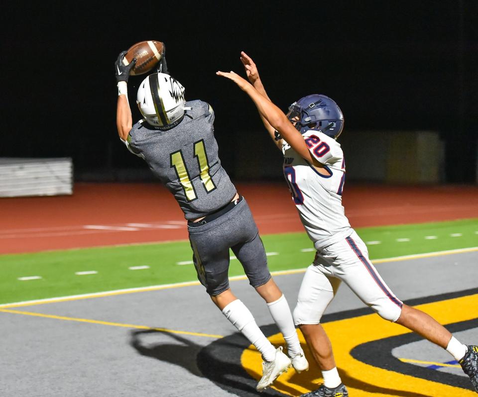 Oak Park's Nico Mastrippolito catches a touchdown pass during the Eagles' 22-21 comeback victory over Brentwood School on Sept. 8.