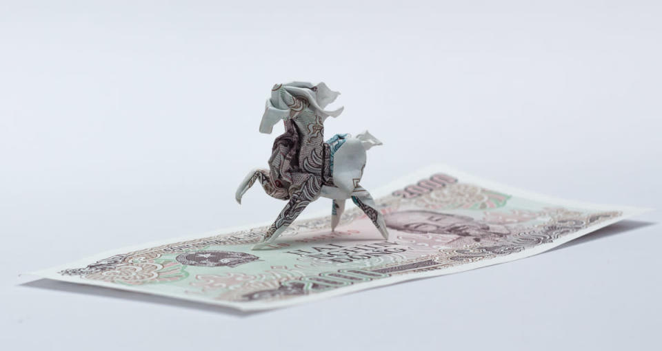 Origami art - Horse. Yesterday I was asked to fold a horse from Vietnamese money. The paper was so small but I tried to archive as many detail as I could. Someday I will fold it again with larger paper.