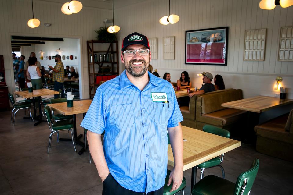 Cory Barrett poses for a photo at Barrett's All Day, Friday, June 30, 2023, at 3242 Crosspark Road in Coralville, Iowa.