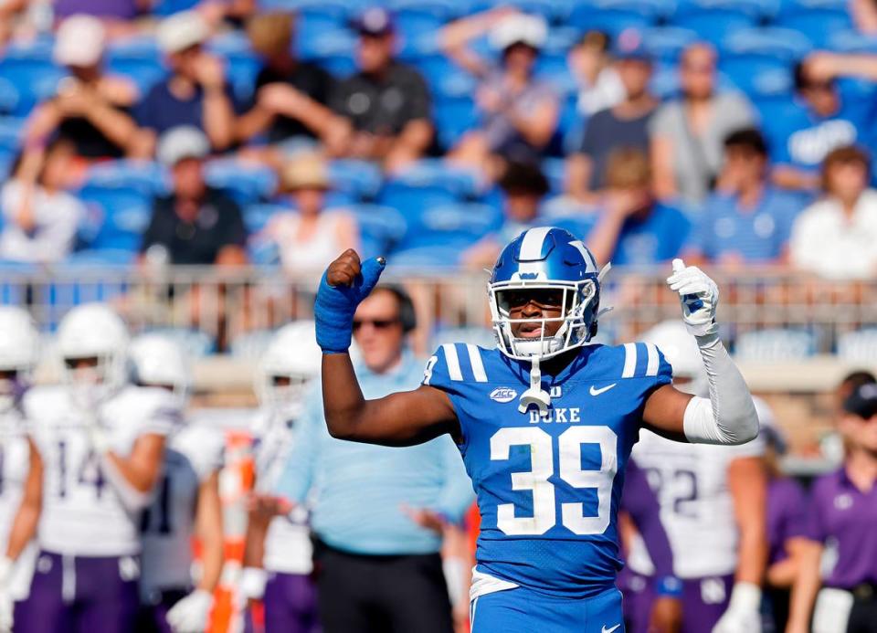 Duke’s Jeremiah Lewis gestures towards the sidelines during the first half of the Blue Devils’ 38-14 win over Northwestern on Saturday, Sept. 16, 2023, at Wallace Wade Stadium in Durham, N.C. Lewis, who suffered a broken thumb during Duke’s season-opening win over Clemson, returned to the field on Saturday. Kaitlin McKeown/kmckeown@newsobserver.com