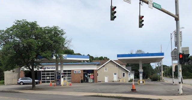 The owners of the Quicklee's chain have gotten permission to tear down a Mobil station and house at Brighton's Twelve Corners to put up a Quicklee's gas station and convenience store.