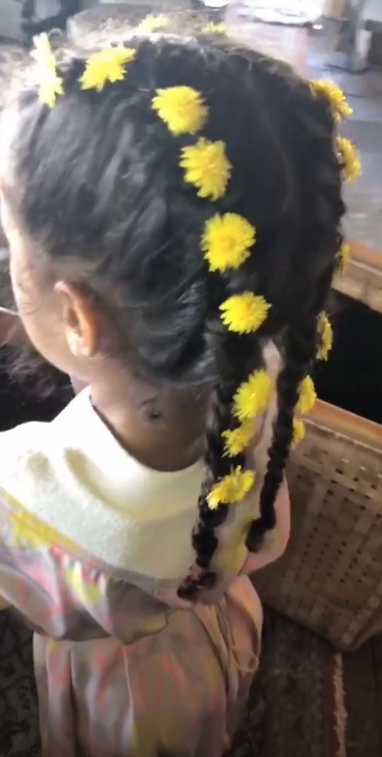 A closer look at North West’s floral braids. (Photo: Kim Kardashian via Instagram Stories)