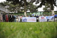 In this Friday, April 30, 2021, photo former Afghan interpreters hold placards during a protest against the U.S. government and NATO in Kabul, Afghanistan. (AP Photo/Mariam Zuhaib)