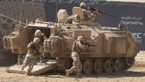 <p><span>Members of the United Arab Emirates' armed forces take part in a military show launching the International Defence Exhibition and Conference (IDEX) at the Abu Dhabi National Exhibition Centre in the Emirati capital on February 17, 2013.</span></p>