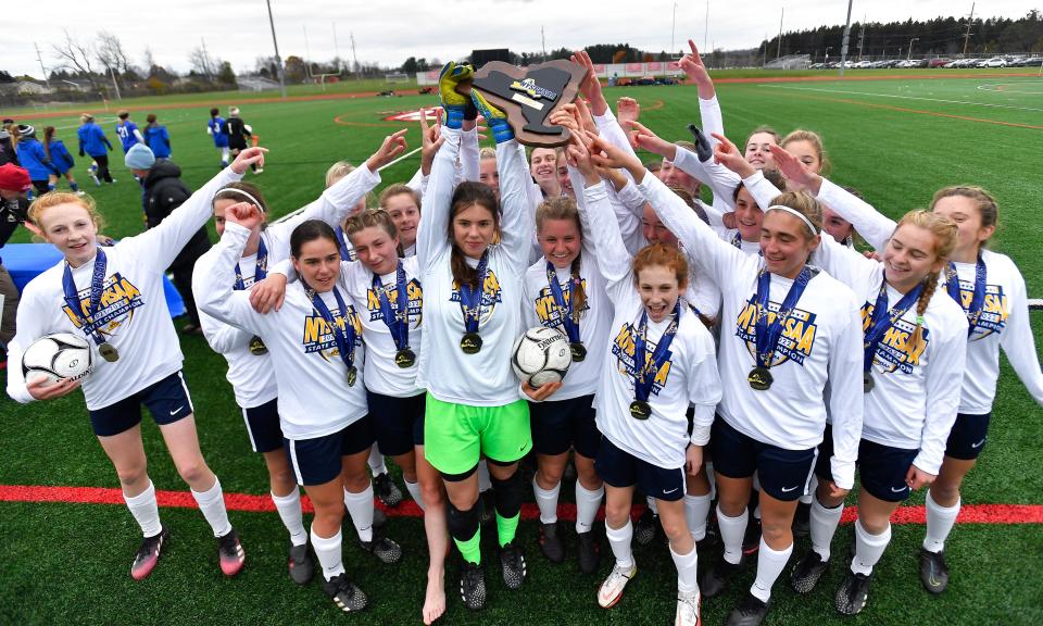 Mount Academy celebrates its win against Poland in the NYSPHSAA Girls Soccer Championships Class D final in Cortland, N.Y., Sunday, Nov. 14, 2021.