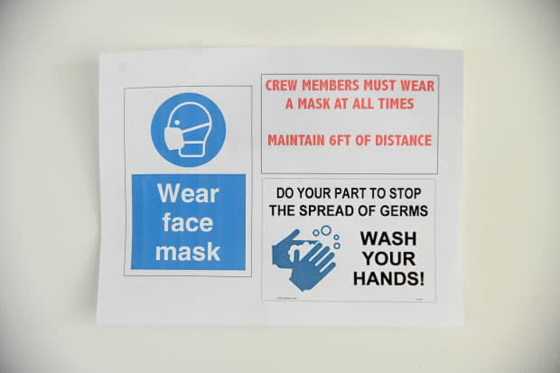 Signs were put up in Spring Studios detailing various Covid-19 safety precautions in September 2020, during the first New York Fashion Week following worldwide pandemic lockdowns. <p>Photo: Jamie McCarthy/Getty Images</p>