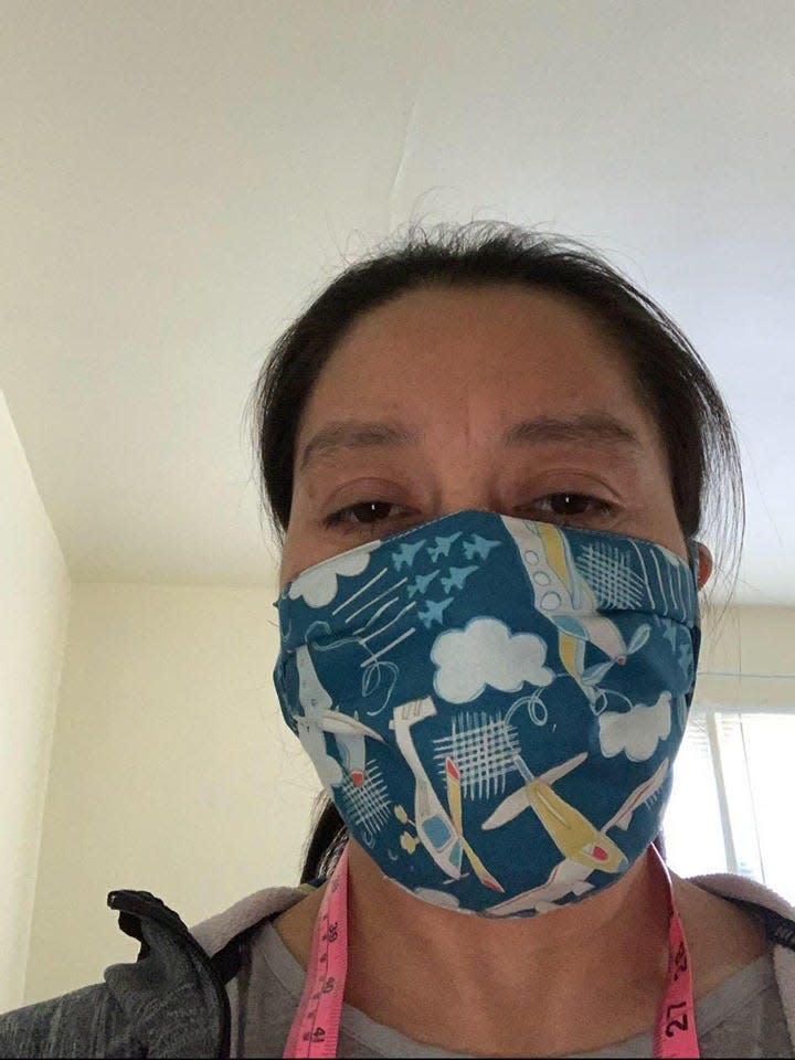 Maritza Duarte of Spring Valley shows one of the  masks she made for health-care workers as part of The Masked Warriors Project (Rockland County, NY) Facebook group.