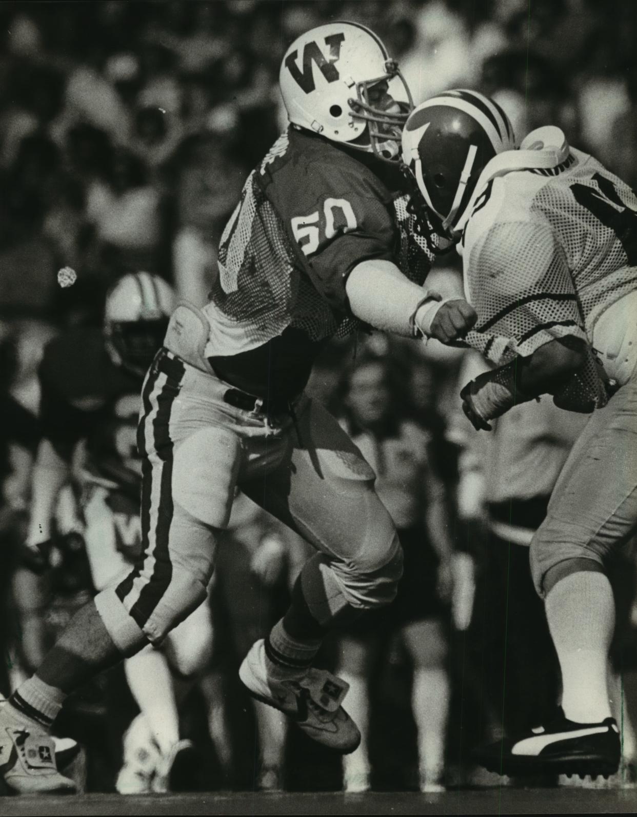 Tim Krumrie squared off against a Michigan lineman in the Badgers' opener at Camp Randall stadium in 1981. Krumrie was named the national lineman of the week for his performance.