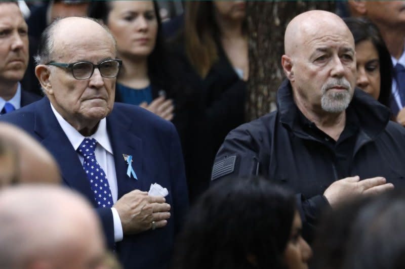 Rudy Giuliani (L), former Mayor of New York City, and former New York City Police Commissioner Bernie Kerik attend the 911 Commemoration Ceremony at the National September 11th Memorial and Museum in New York City on Sept. 11. Photo by Peter Foley/UPI