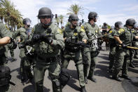 <p>Orange County Sheriff’s deputies yell as they try to disperse protesters near the Anaheim Convention Center on May 25, 2016, in Anaheim, Calif, after a rally by Republican presidential candidate Donald Trump at the convention center. (AP Photo/Jae C. Hong) </p>