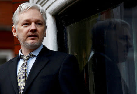 FILE PHOTO: WikiLeaks founder Julian Assange makes a speech from the balcony of the Ecuadorian Embassy, in central London, Britain February 5, 2016. REUTERS/Peter Nicholls/File Photo