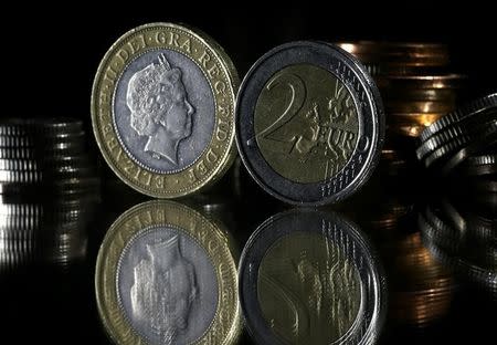 Pound and Euro coins are seen in this picture illustration taken January 18, 2017. REUTERS/Dado Ruvic/Illustration