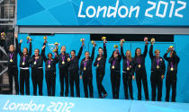 Gold medallists the United States celebrate on the podium during the medal ceremony for the Women's Water Polo on Day 13 of the London 2012 Olympic Games at the Water Polo Arena on August 9, 2012 in London, England. (Getty Images)