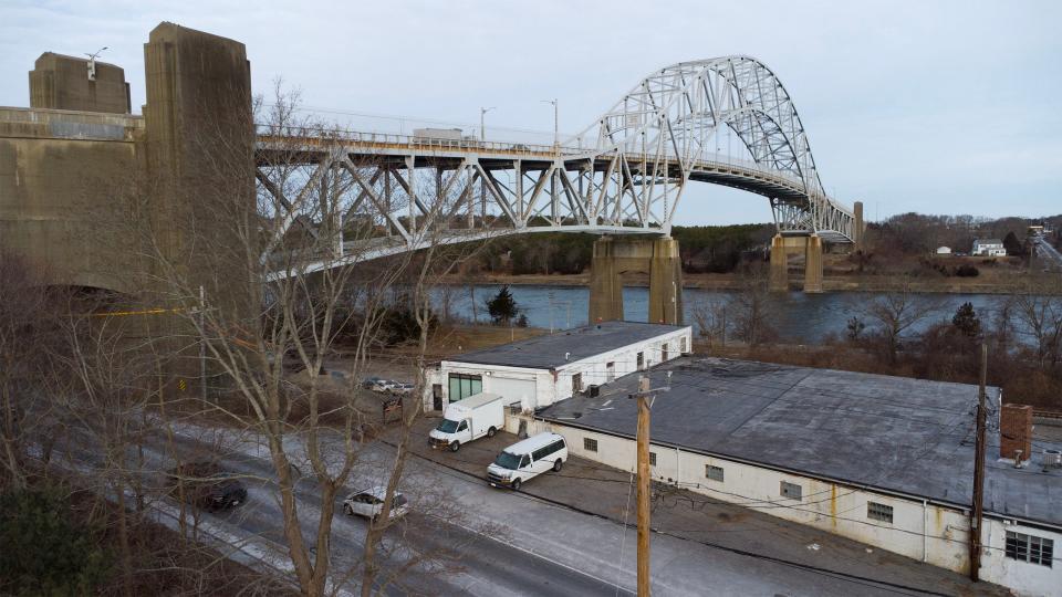 Light traffic can be seen on the Sagamore Bridge and on Sandwich Road underneath it, after the morning rush hour in January. Officials said they expect noteworthy developments in 2024 toward replacement of the two Cape Cod Canal bridges.