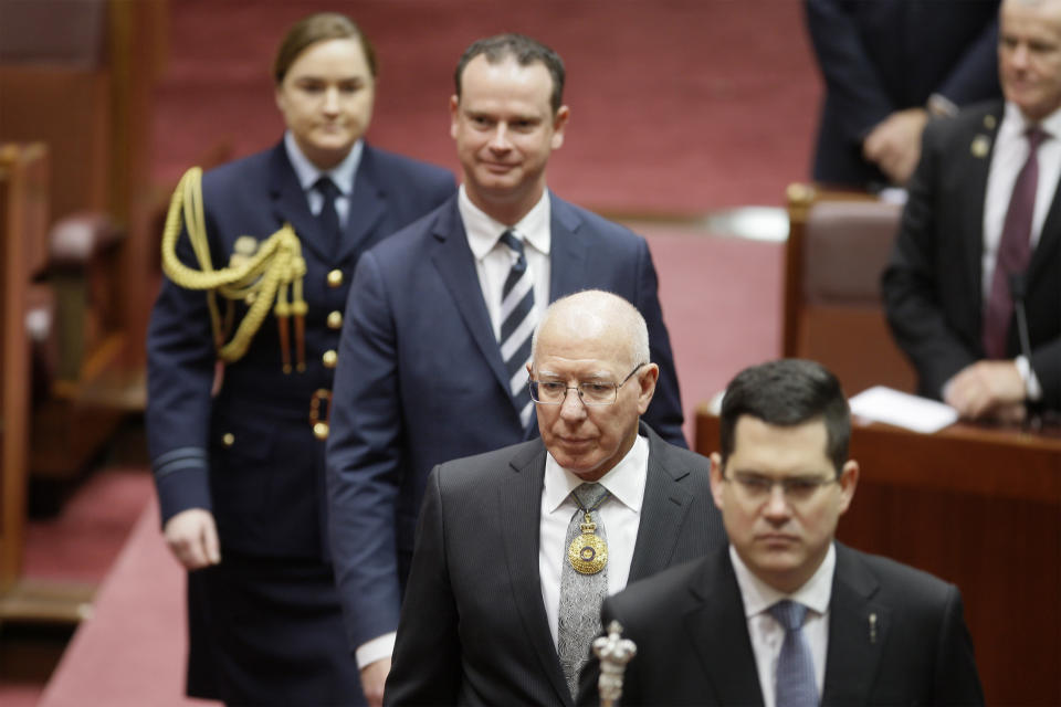 Former soldier David Hurley, second from bottom, is sworn in as Australia’s governor-general at a ceremony in Parliament House in Canberra Monday, July 1, 2019. Hurley will officiate on Tuesday when Parliament resumes for the first time since Prime Minister Scott Morrison's conservative government was elected to a third three-year term. (AP Photo/Rod McGuirk)