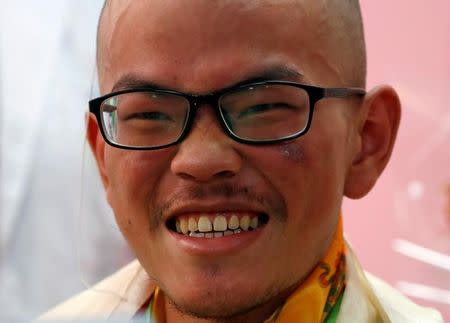 Taiwanese hiker Liang Sheng Yueh, who was lost in the Himalayas for over a month, smiles as he celebrates his 21st birthday at a hospital after being rescued, in Kathmandu, Nepal April 28, 2017. REUTERS/Navesh Chitrakar