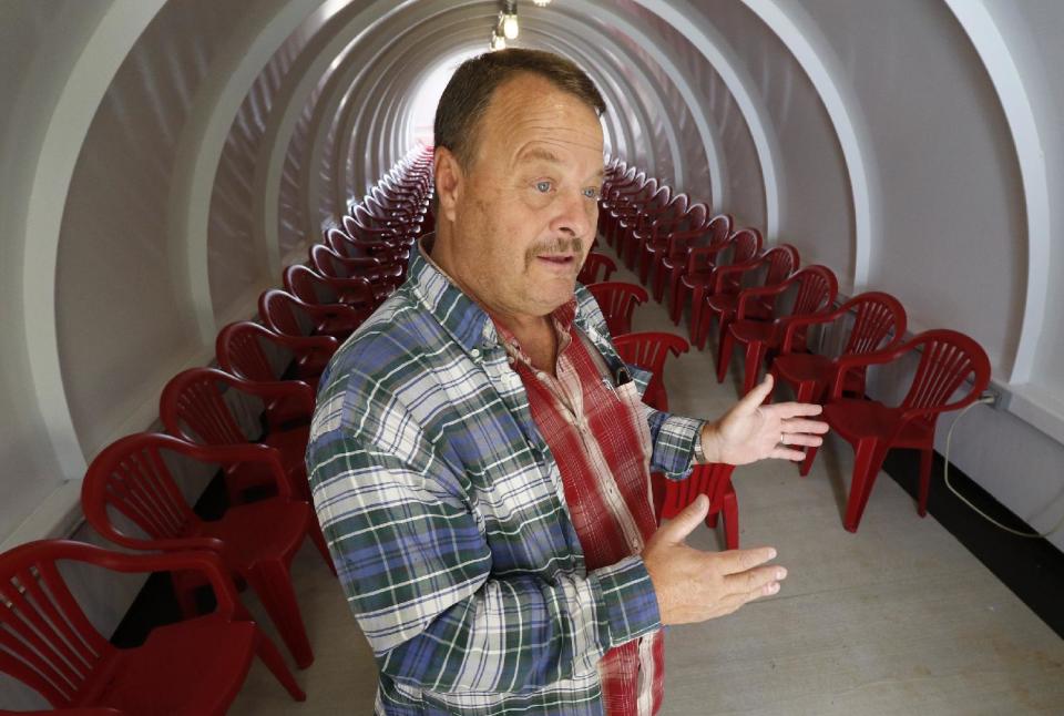 In an Oct. 22, 2015 photo, David A. Roden, owner of Mountain View Estates, speaks about a tornado shelter that he built for his mobile home park residents in Rossville, Ga. Experts have long warned that people in mobile homes face a greater risk of death from tornadoes, yet laws requiring storm shelters in trailer parks or public spaces such as schools are few and far between. Roden believes he is the first park owner in the southeast to offer residents a storm shelter. (Dan Henry/Chattanooga Times Free Press via AP) /Chattanooga Times Free Press via AP)