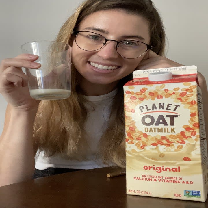farrah posing with planet oat oatmilk glass