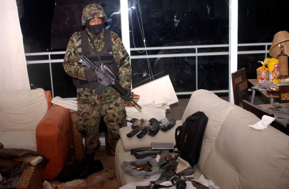 The home of Beltran Leyva was filled with illegal firearms when it was raided by Mexican Navy members in 2009. REUTERS