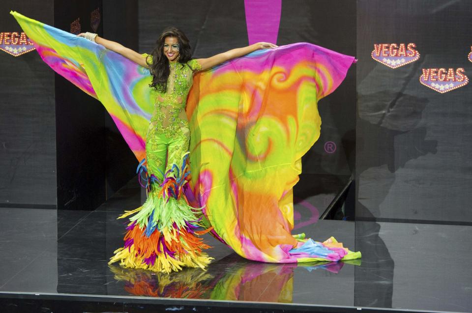 Kerrie Baylis, Miss Jamaica 2013, models in the national costume contest for Miss Universe 2013 at Vegas Mall in Moscow