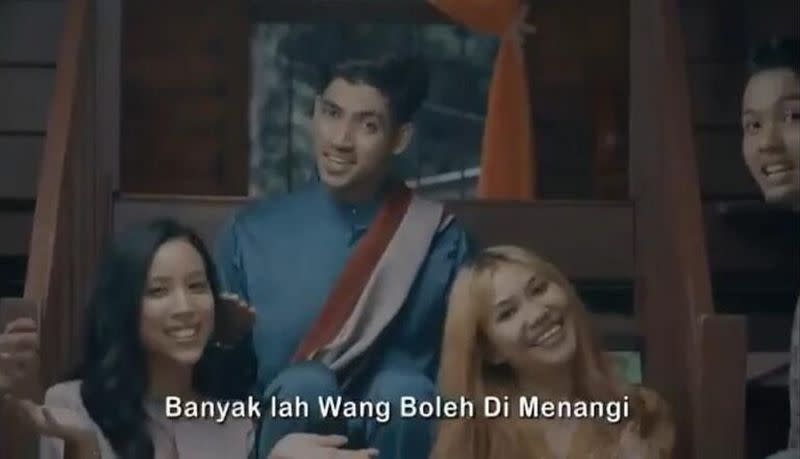The advertisement, which went viral, shows a man who wants to 'balik kampung' making extra money via online gambling. — SoyaCincau pic