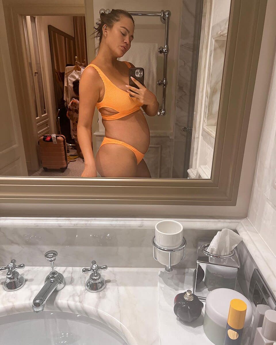 Chrissy Teigen Shares Bump Pictures in a Photo Dump from Family Vacation